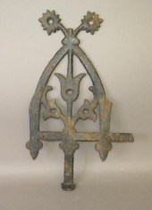 CAST IRON FIGURAL CELLAR WINDO