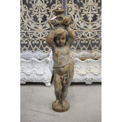 Cast iron figure of child, approx