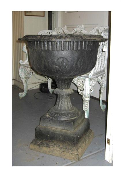 Cast iron garden urn    stamped,