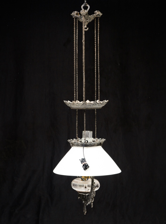 CAST IRON HANGING LIGHT FIXTURE.