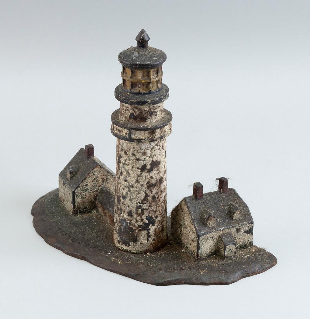 CAST IRON HIGHLAND LIGHT DOORSTOP