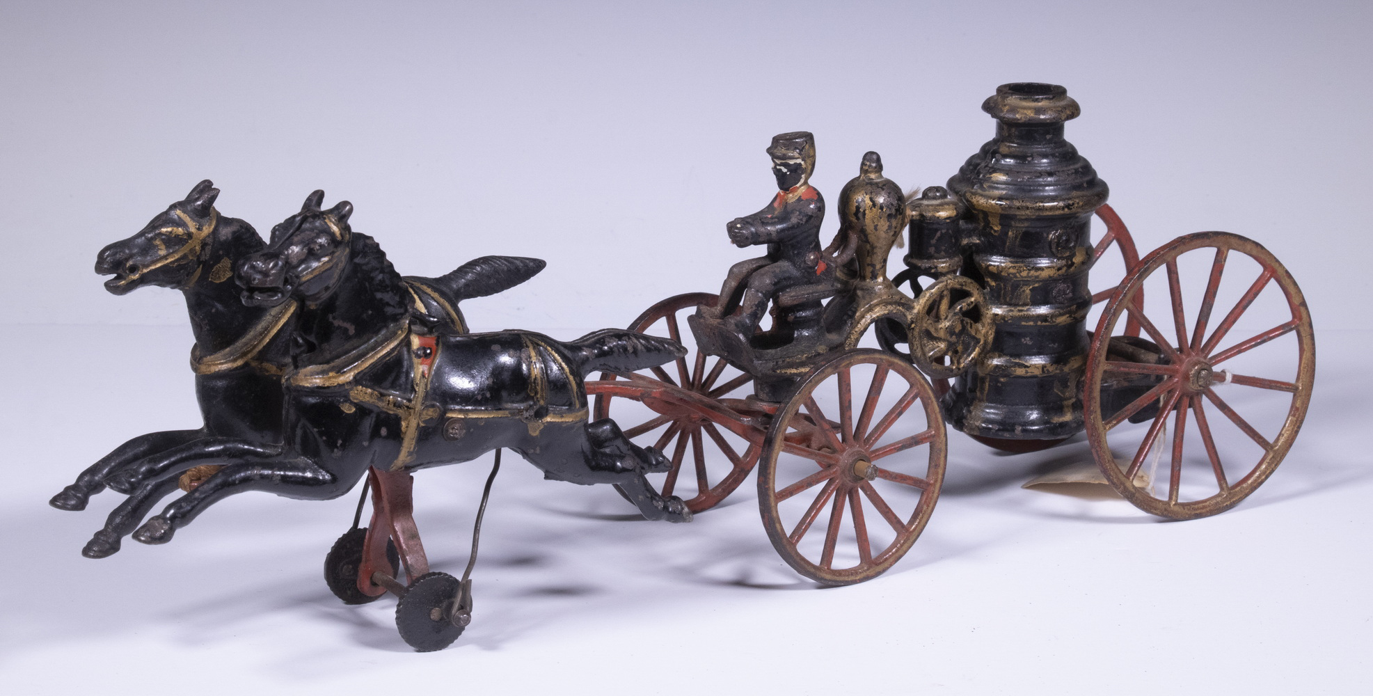 CAST IRON HORSE DRIVEN PUMPER WAGON