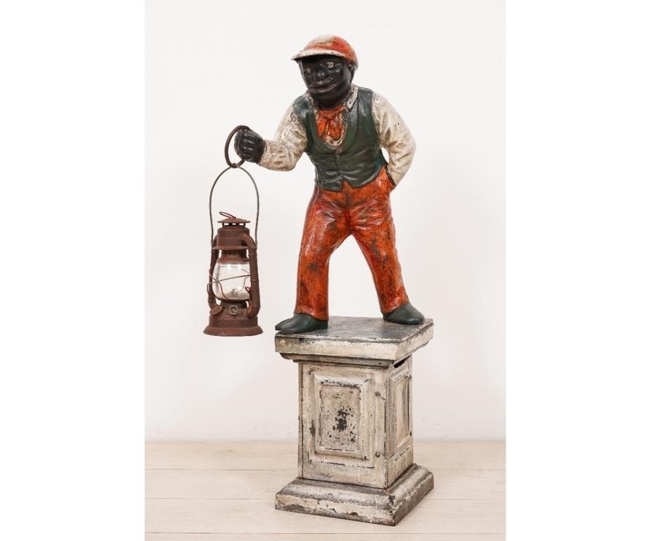 Cast iron lawn jockey, repainted,