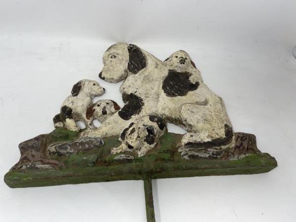 CAST IRON LAWN ORNAMENT DOG WITH
