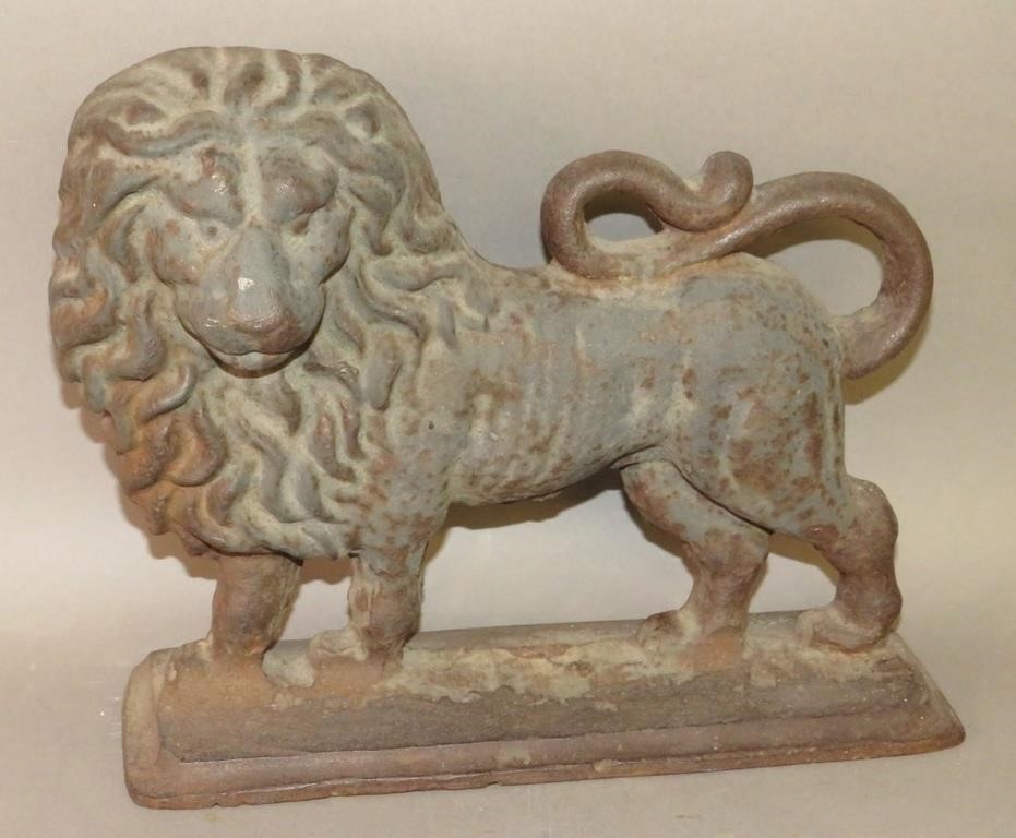 CAST IRON LION DOORSTOPca.