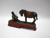 CAST IRON MECHANICAL BANK, "AL