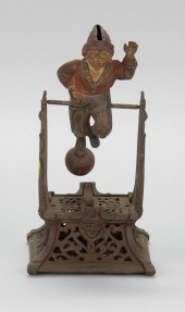 CAST IRON MECHANICAL BANK BOY