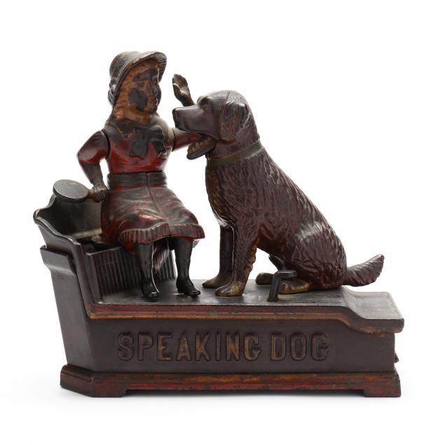 CAST IRON MECHANICAL BANK, GIRL AND