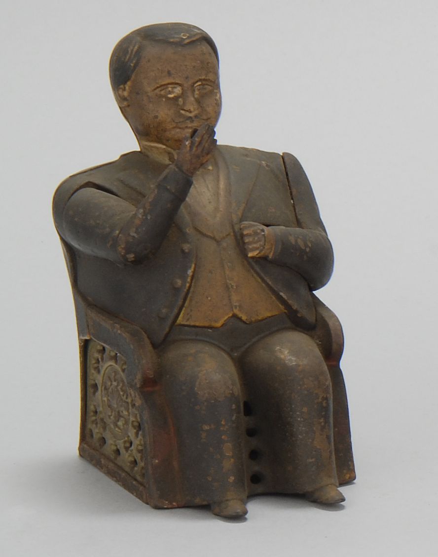 CAST IRON MECHANICAL BANK