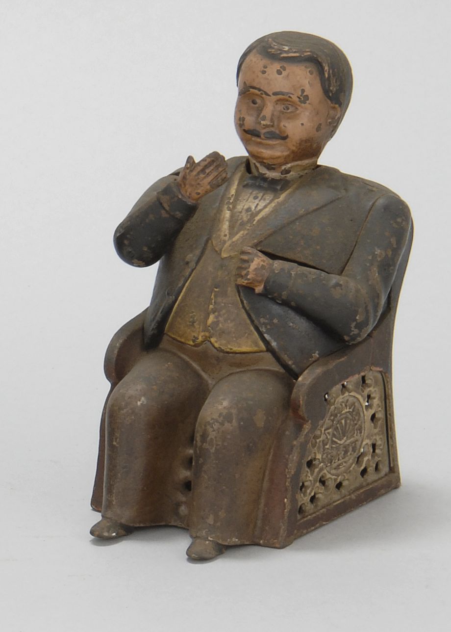 CAST IRON MECHANICAL BANK