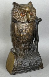 CAST IRON MECHANICAL OWL BANK