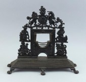 CAST IRON MODEL OF A FIREPLACE
