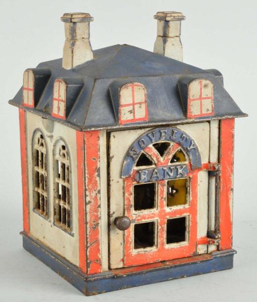 Cast Iron Novelty Mechanical Bank.