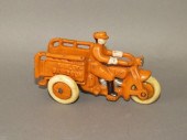CAST IRON ORANGE PAINTED TOY H
