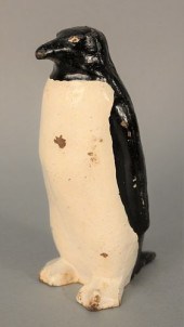 CAST IRON PENGUIN DOOR STOP IN