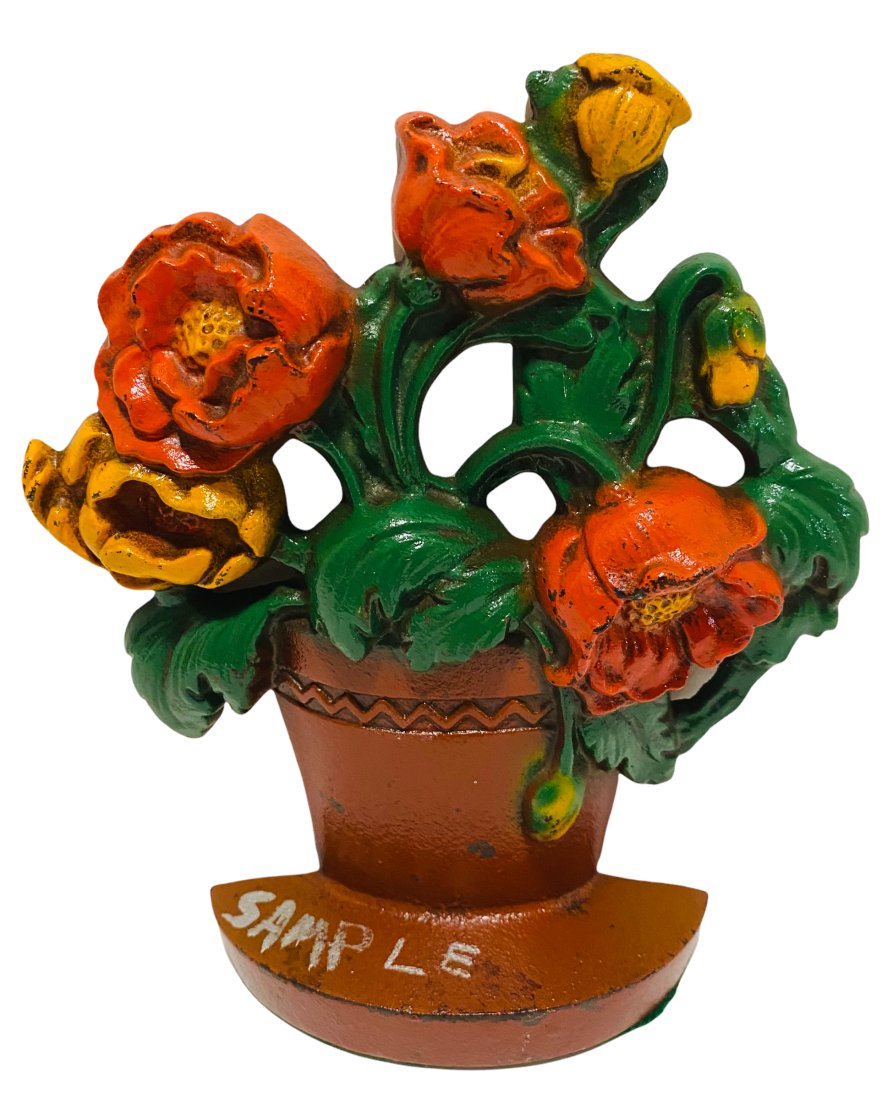 CAST IRON POPPIES IN A CLAY POT