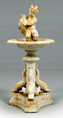 Cast iron putti and dolphin figural