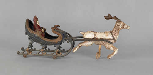 Cast iron Santa and sleigh pull toy