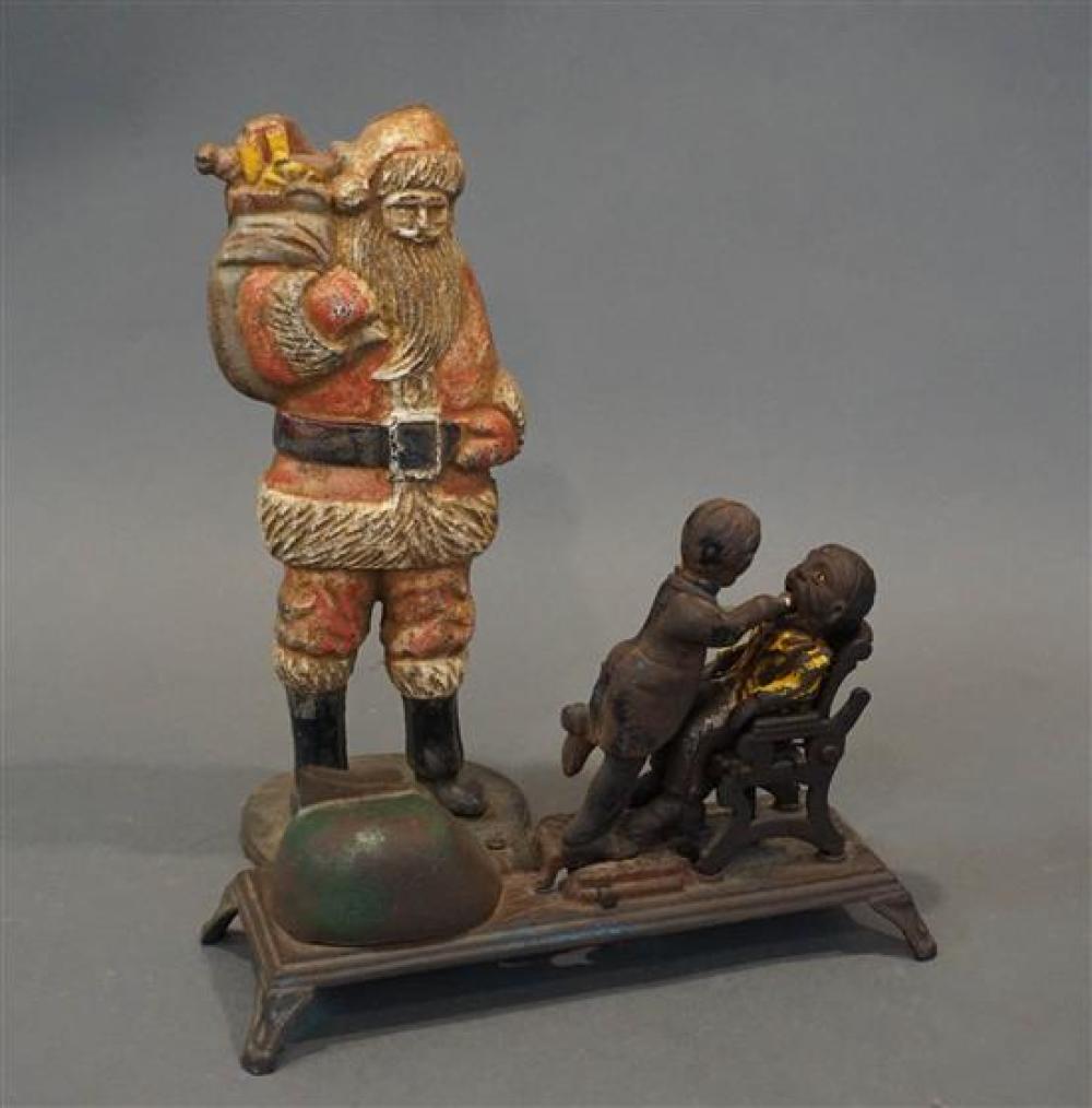 CAST IRON 'SANTA' DOORSTOP AND A