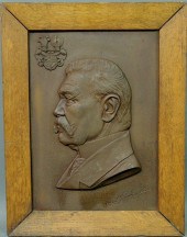 Cast iron side profile portrai