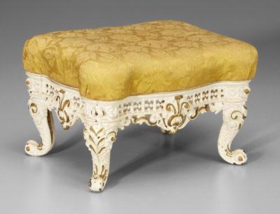 Cast iron stool, scrolled and