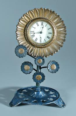 Cast iron sunflower clock, blooming