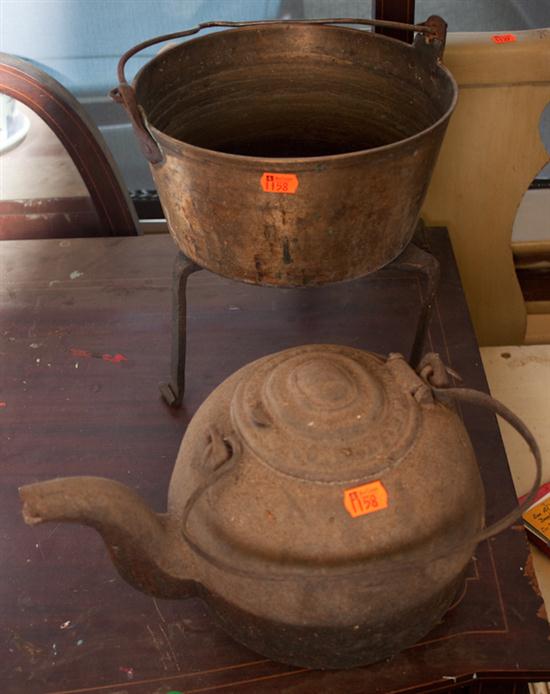 Cast iron tea kettle and a copper