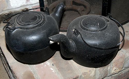 CAST IRON TEA KETTLESA pair of good