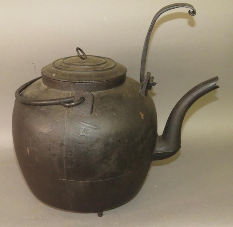 CAST IRON TIPPING TEA KETTLEca.