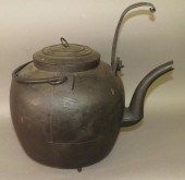 CAST IRON TIPPING TEA KETTLEca