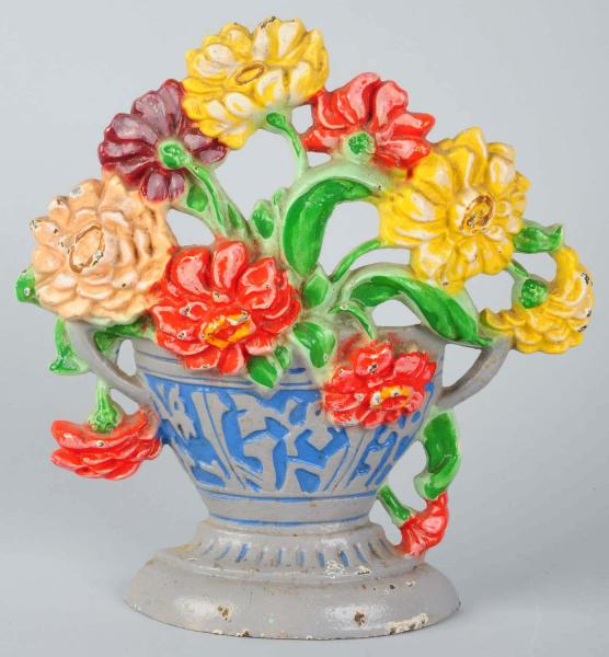 Cast iron Zinnias in Urn Flower