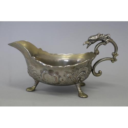 Cast metal griffin handled sauce