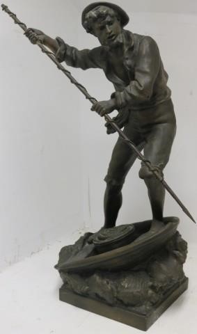 CAST METAL SCULPTURE DEPICTING A