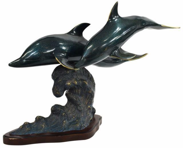 CAST METAL SWIMMING DOLPHINS
