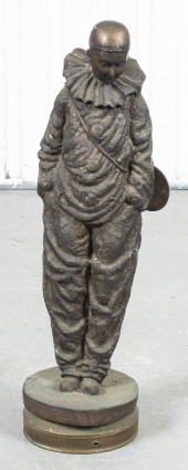 CAST SCULPTURE OF A HARLEQUIN