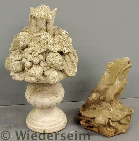 Cast stone garden ornament in the