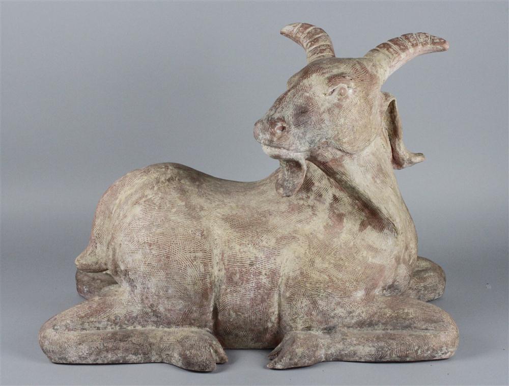 CAST STONE GARDEN SCULPTURE OF A