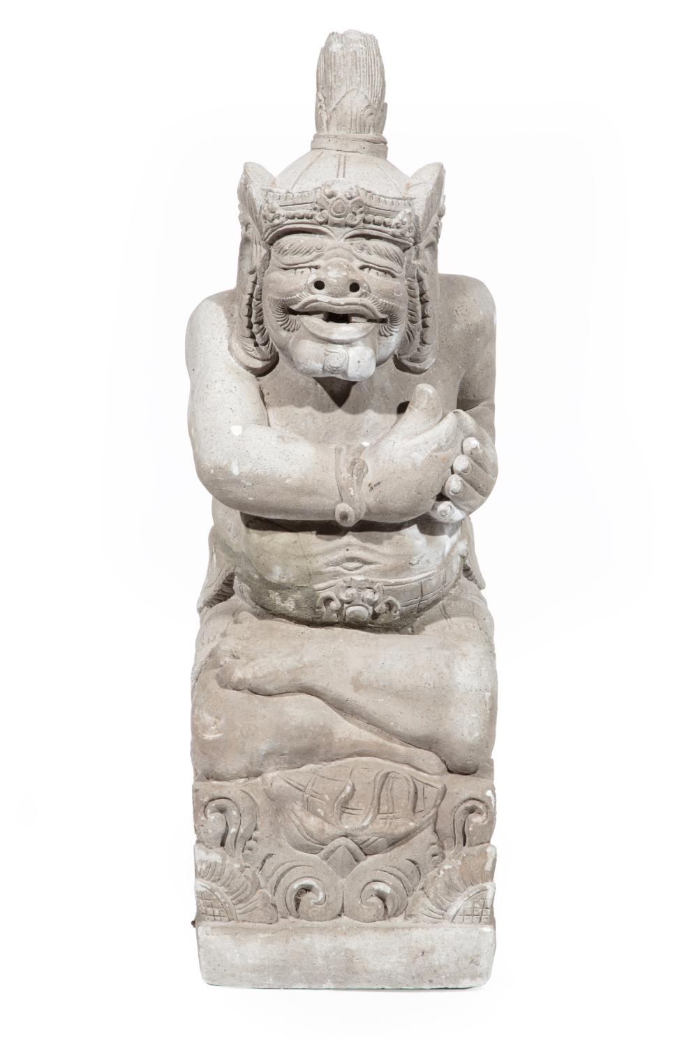 CAST STONE SEATED FIGURE OF A