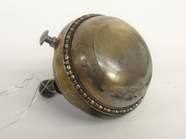 Cast wind up bell.