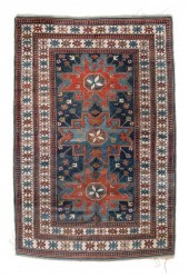 CAUCASIAN RUG: 3’9” X 5’7” EAR
