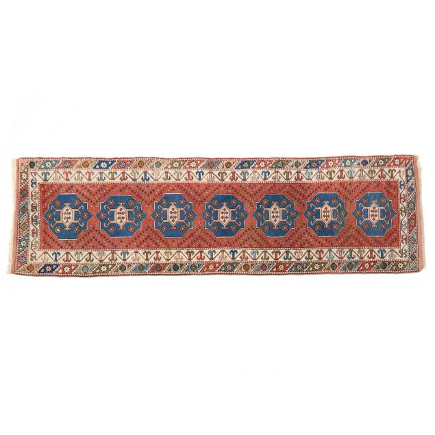 CAUCASIAN RUNNER Orangish-red field
