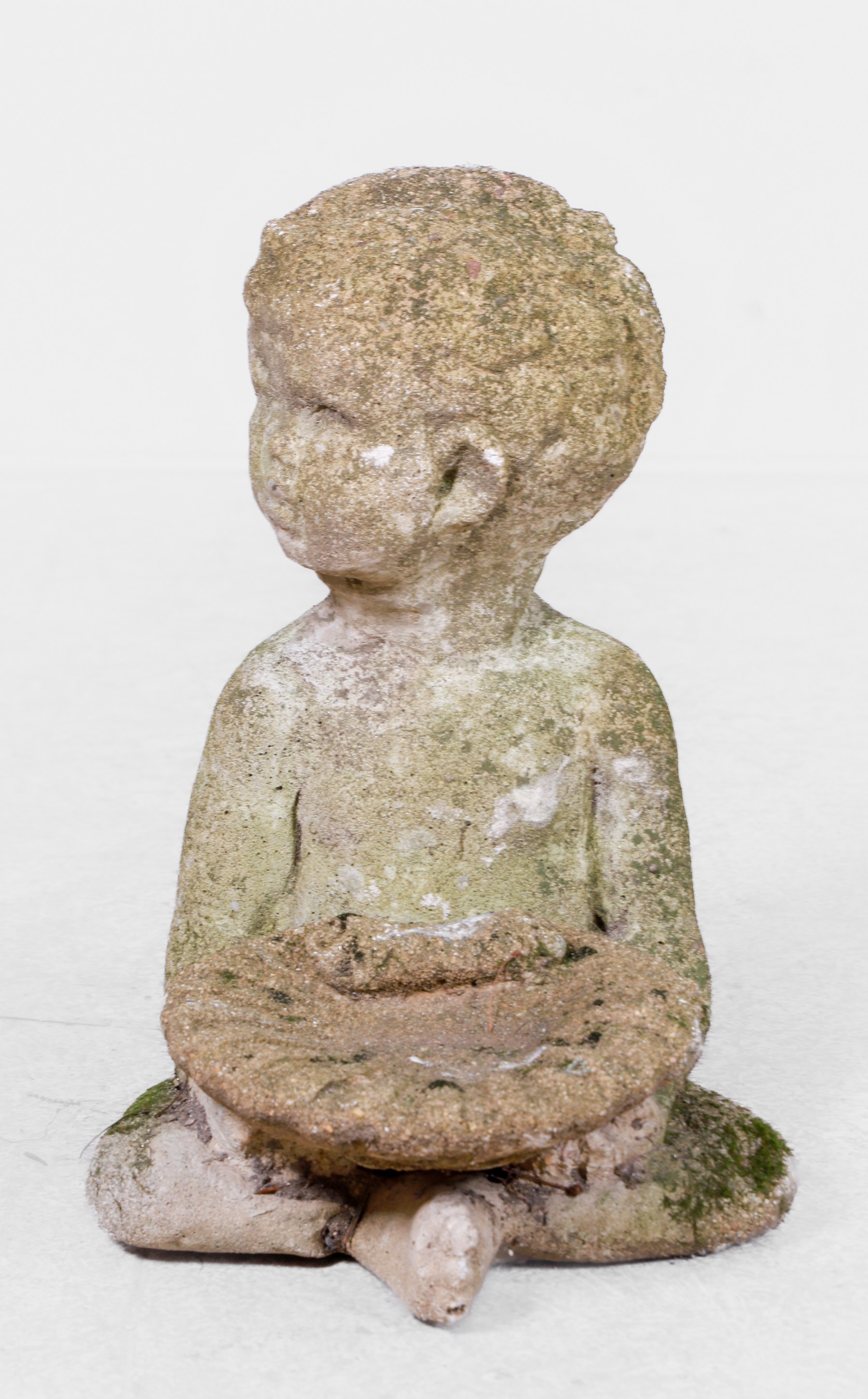 Cement putti garden statue