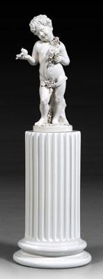 Ceramic figure, child holding