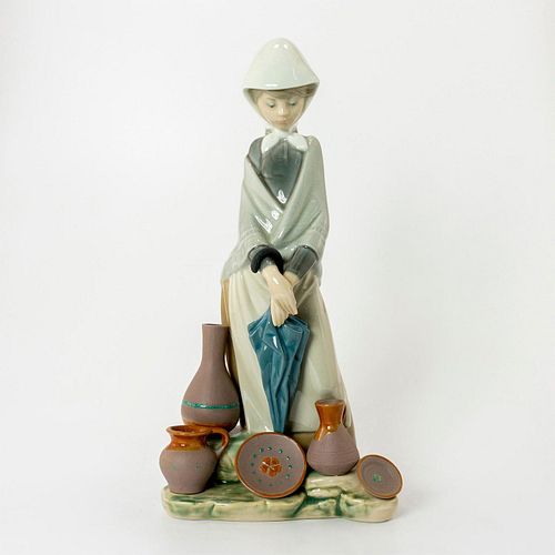 CERAMIC SELLER WOMAN 1005081 -
