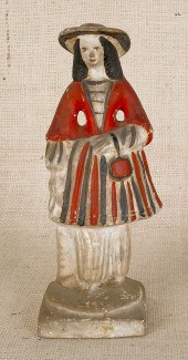 Chalkware figure of a woman 19