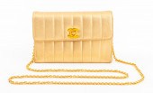 CHANEL GOLD LEATHER HANDBAG Vi
