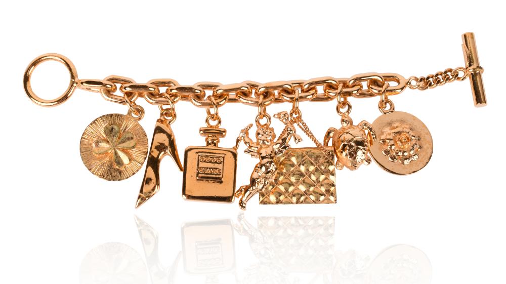 CHANEL GOLD METAL CHARM BRACELET,