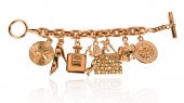 CHANEL GOLD METAL CHARM BRACEL