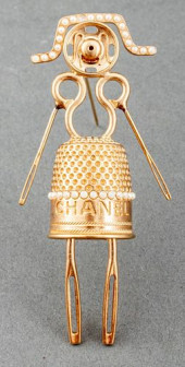 CHANEL RUNWAY GOLD-TONE SEWING
