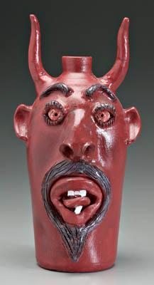Charles Brown devil jug, broken